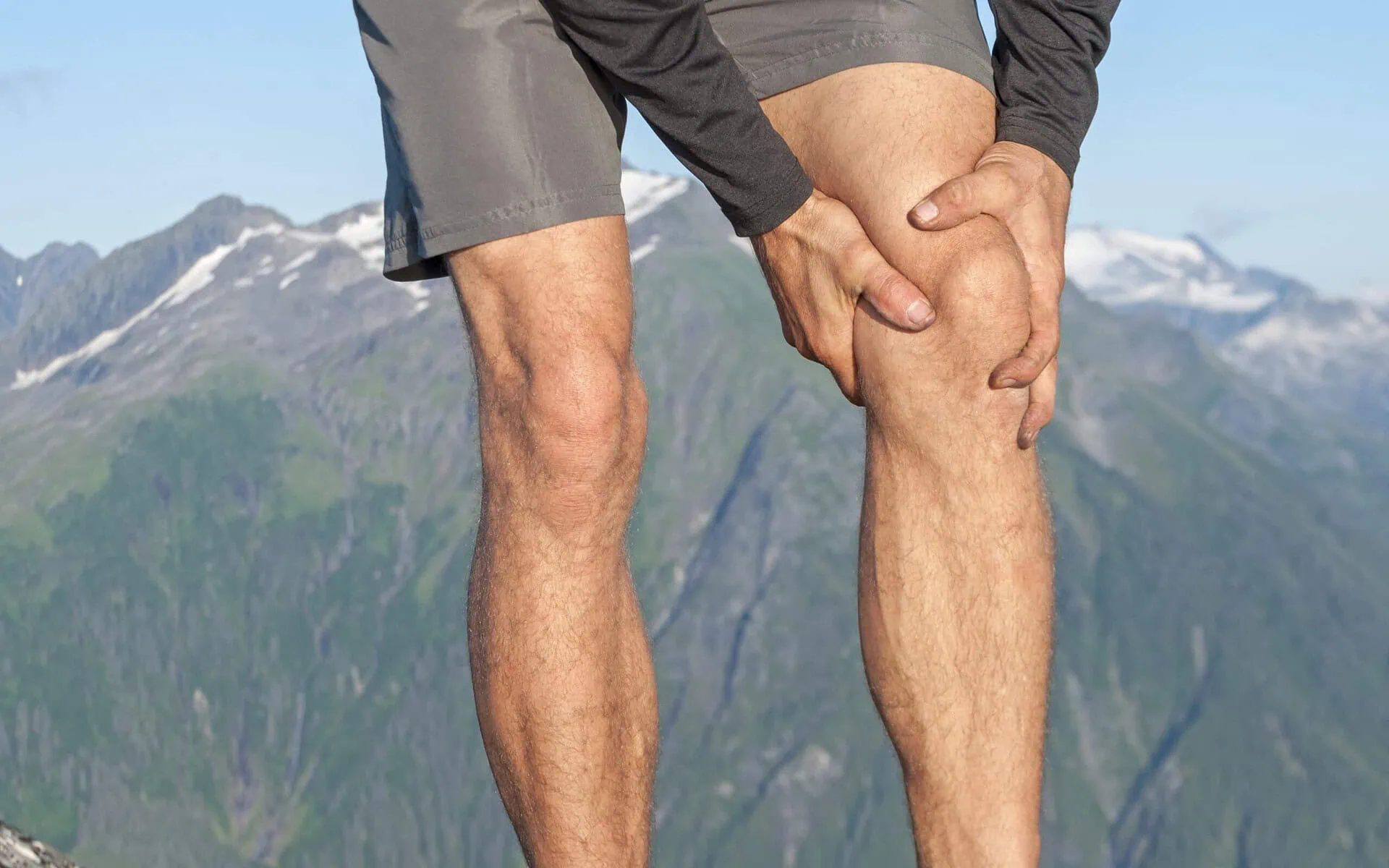 Male Holding Knee Male Holding Knee
