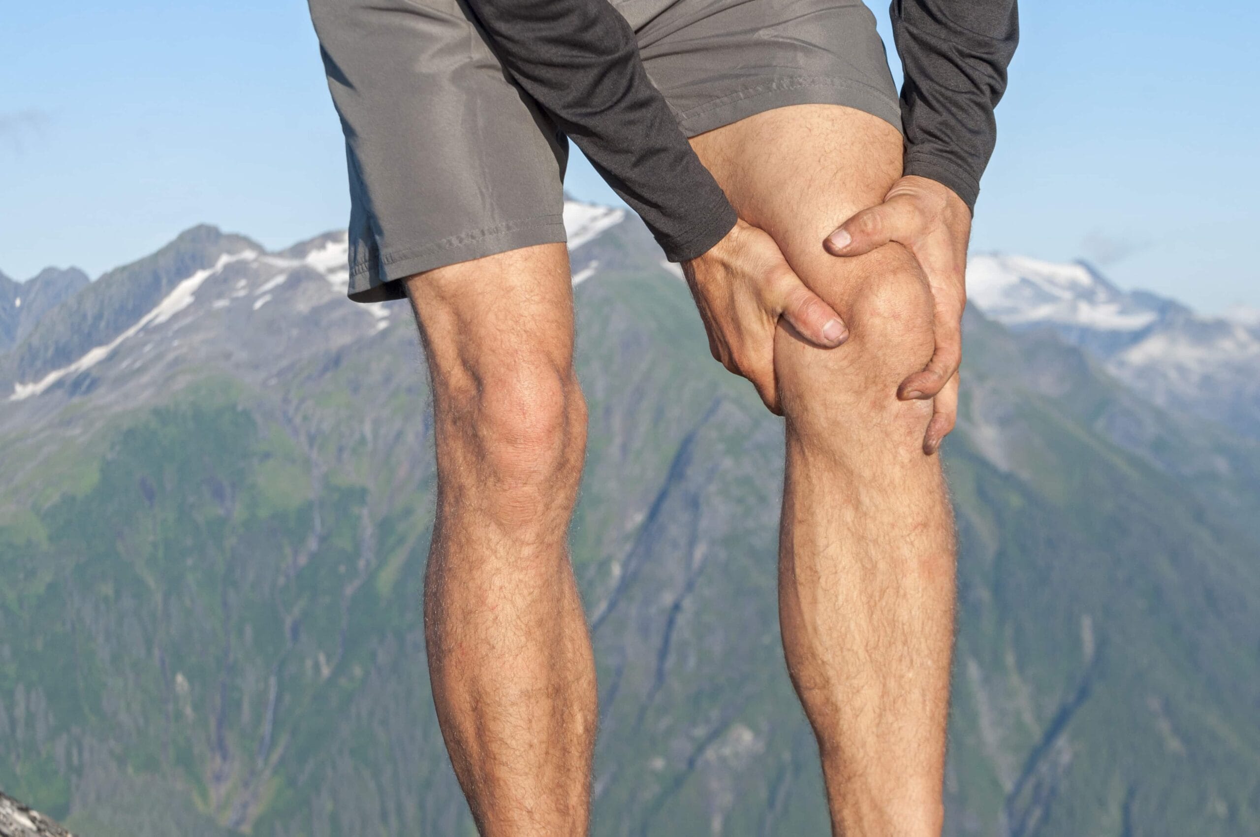 Male Holding Knee