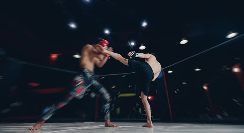 Kickboxer in fighting stance demonstrating proper striking technique